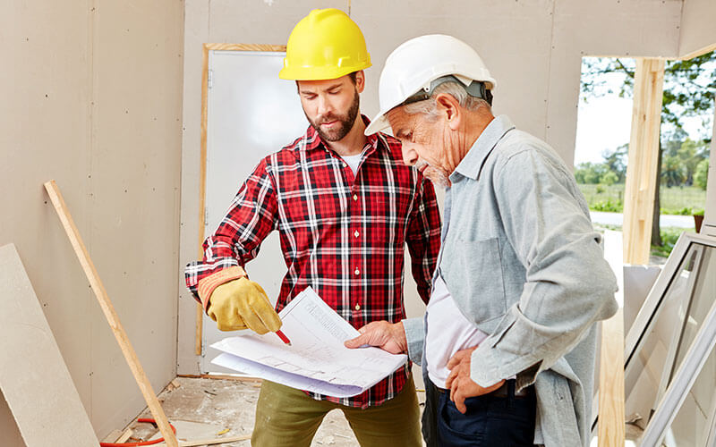 Homebuilders discussing house construction